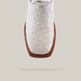 Close-up of the Karoo Ostrich Print White - Square Toe boot, featuring a white textured surface and brown sole, with an ostrich skin-like texture and detailed edge stitching.